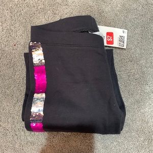 I am selling H and M girls sequin leggings. They flip to pink and silver.
